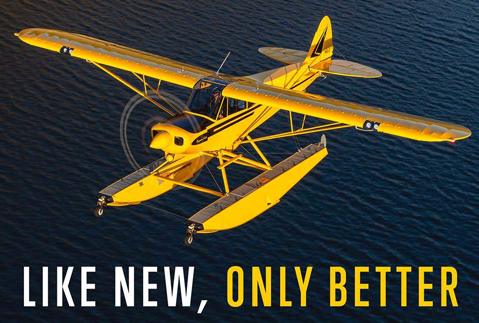 Yellow Lightning Bolt Super Cub in flight